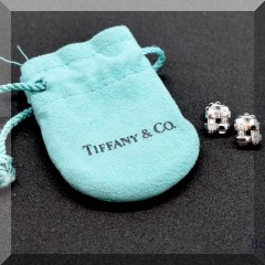 J01. Tiffany & Co. 18K white gold and diamond Vannerie basket weave earrings. - $1250 